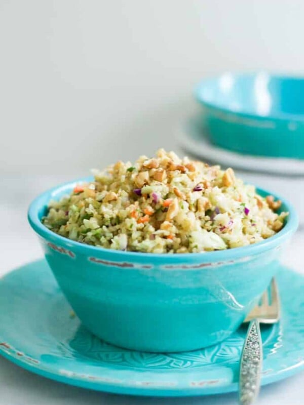 Close-up view of Quinoa Cabbage Salad in a blue bowl