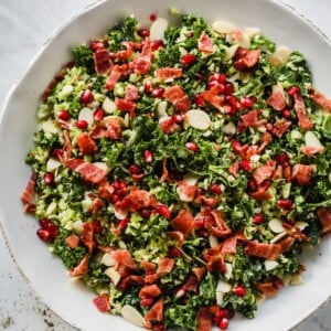 Overhead photo of a plate of shredded Brussels sprout salad.