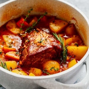 close up of a large white pot containing Whole30 Pot Roast