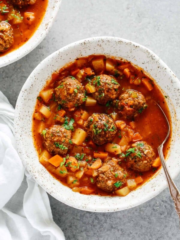 overhead view of a white bowl containing Meatball soup