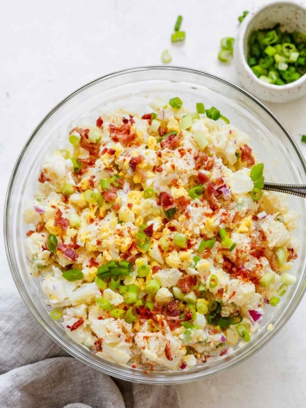 overhead view of a glass bowl containing potato salad