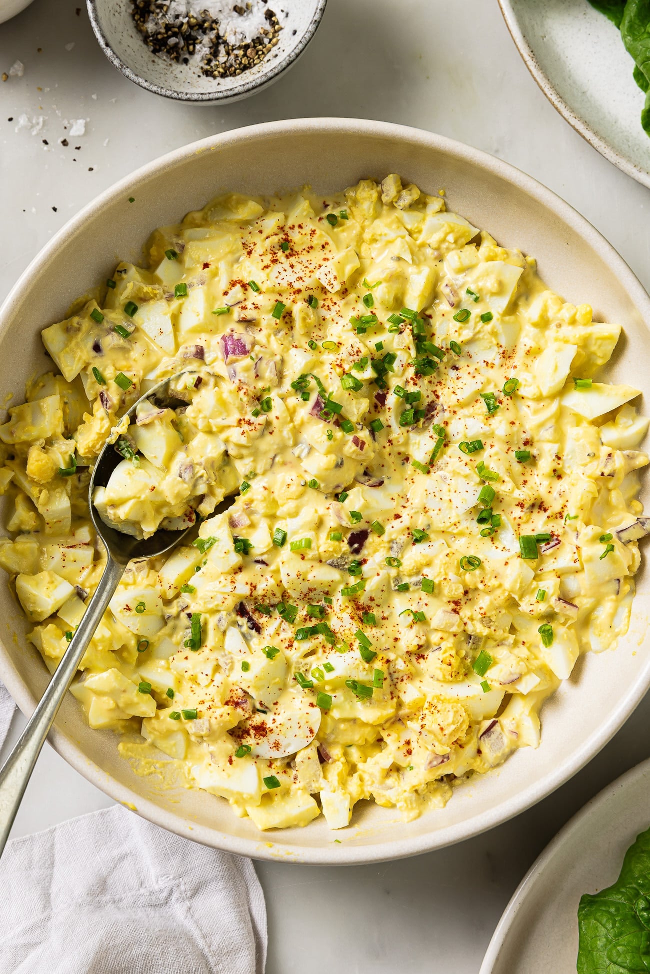 overhead view of an egg salad on a bowl