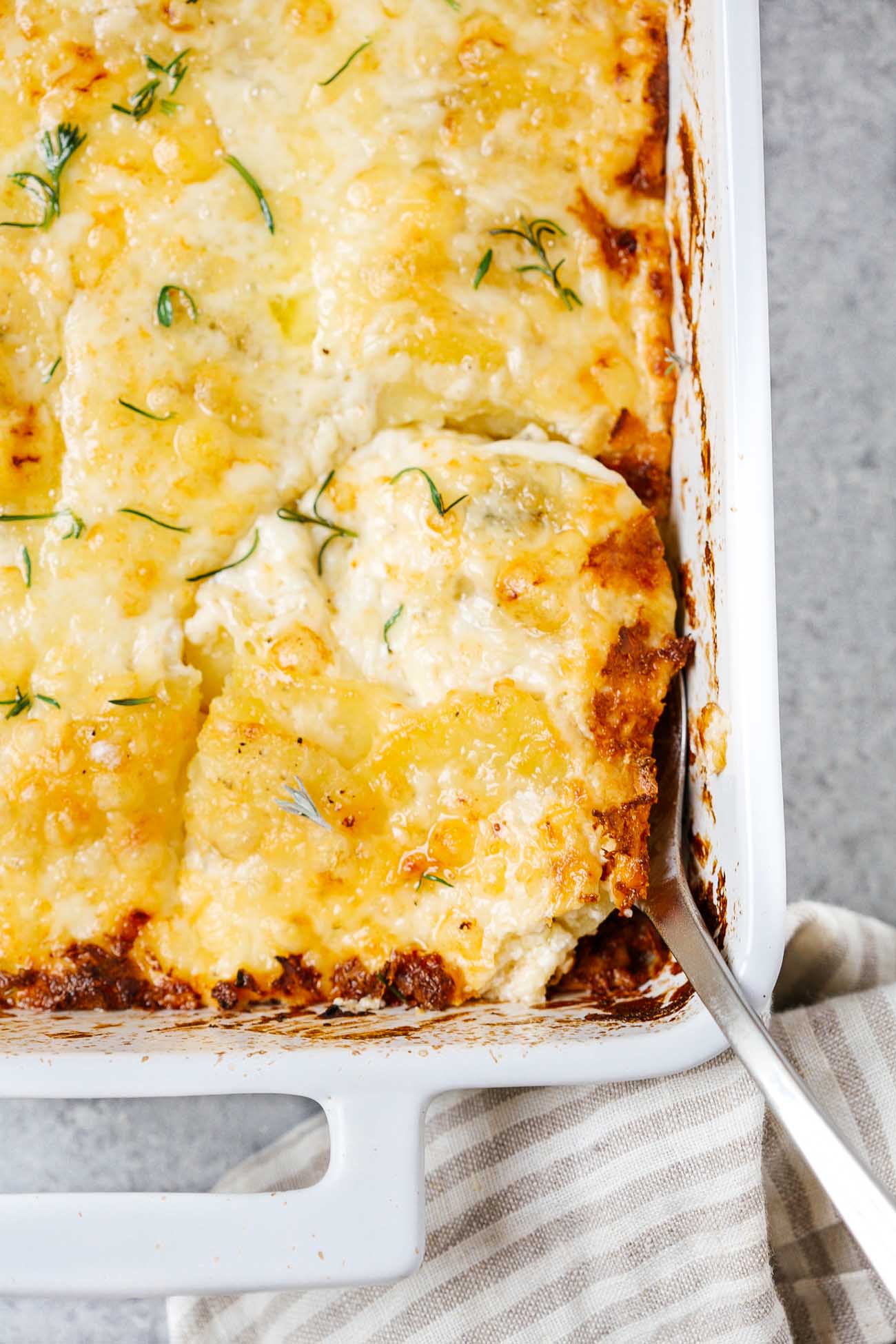 closeup of potatoes au gratin in a casserole