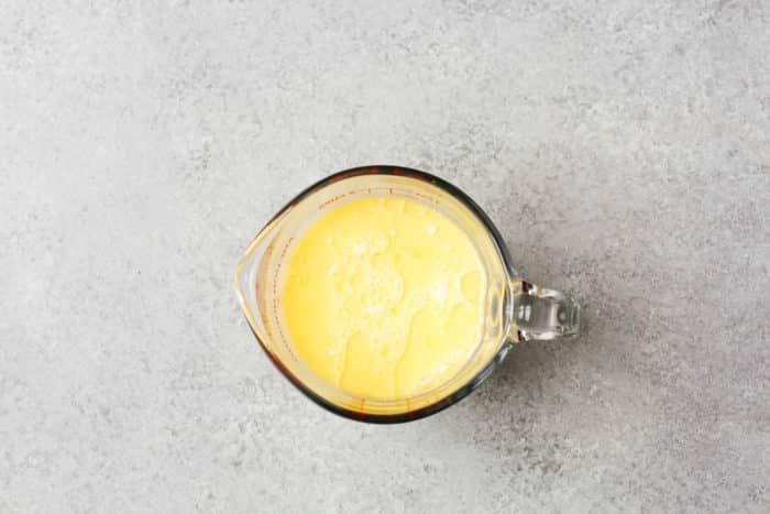 heavy cream and melted butter in a cup