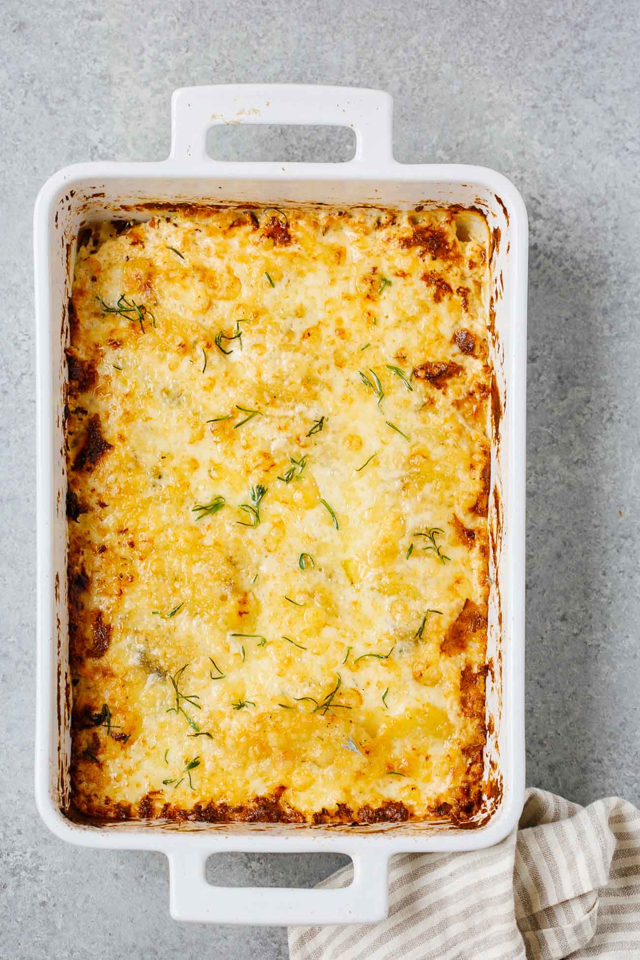 overhead view of potatoes au gratin in a casserole