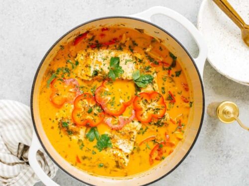 overhead view of fish stew in a white pot