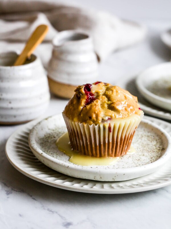 closeup of cranberry muffins in a white small plate