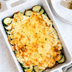 Zucchini casserole in a large, white baking dish.
