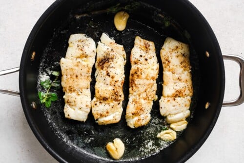 Garlic Butter Haddock in a skillet