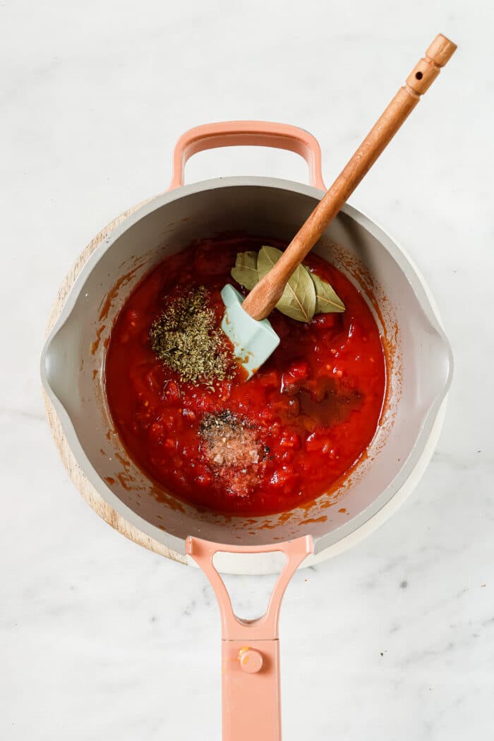 tomato sauce ingredients in a pan
