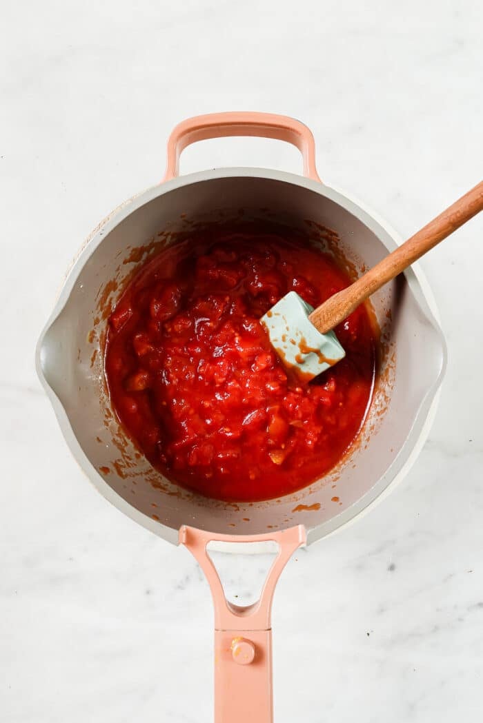 tomato sauce ingredients in a pan