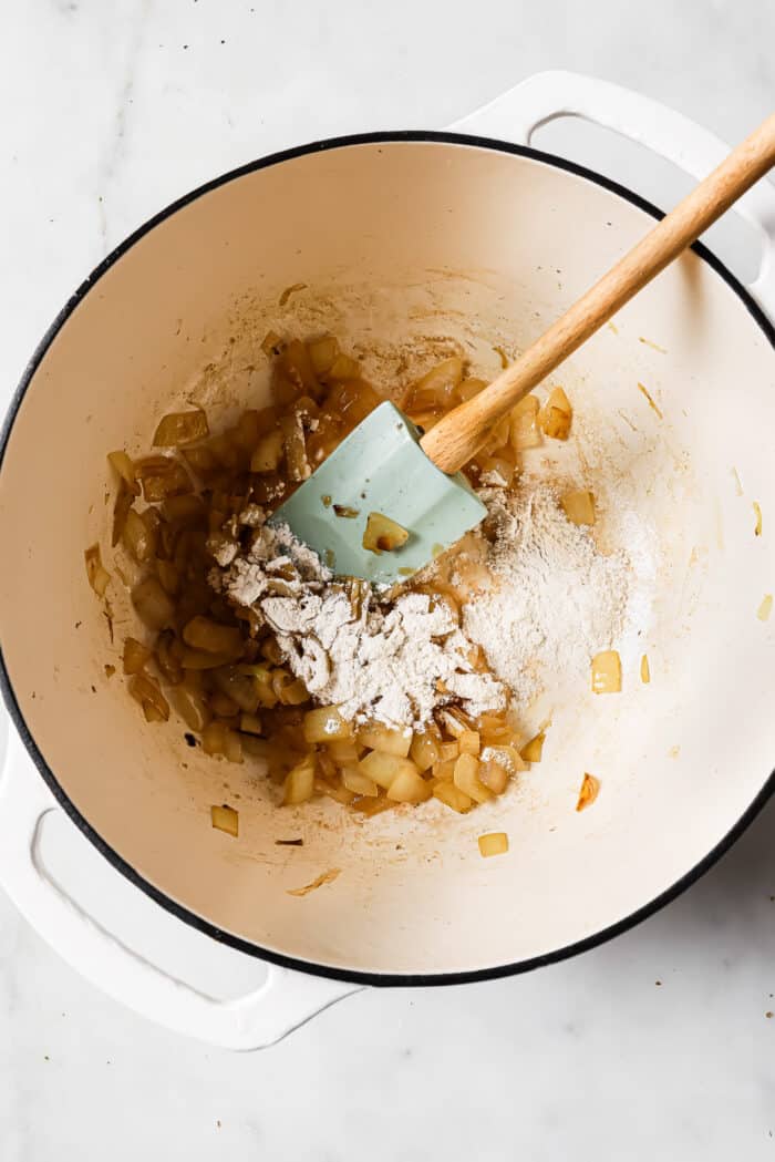 Sauted onions and flour in a Dutch oven.