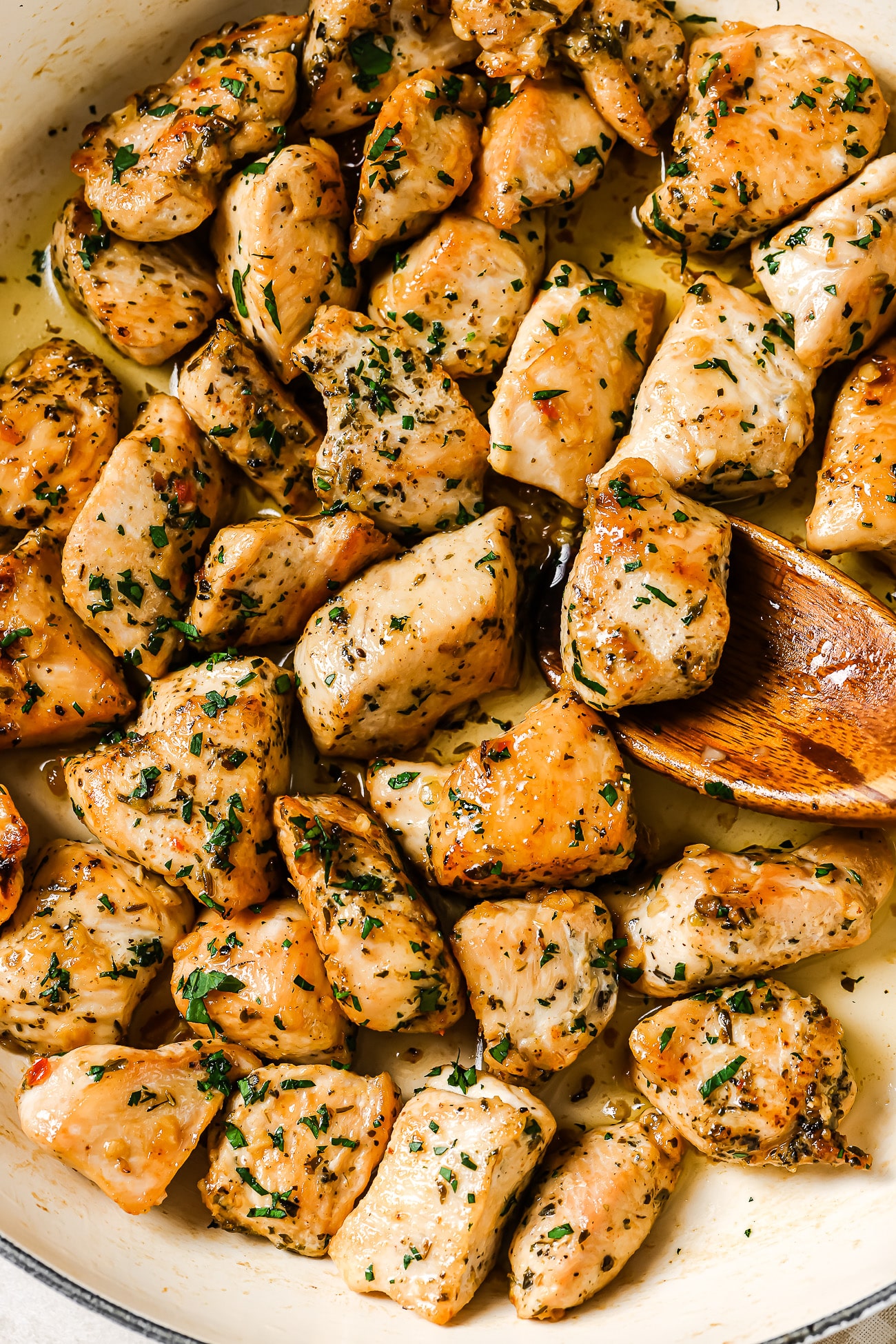 closeup of chicken bites in a white skillet
