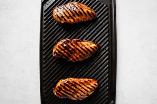 Chicken breast on a grill.