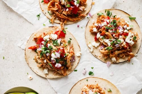 Overhead view of Shredded Chicken Tacos on a countertop.