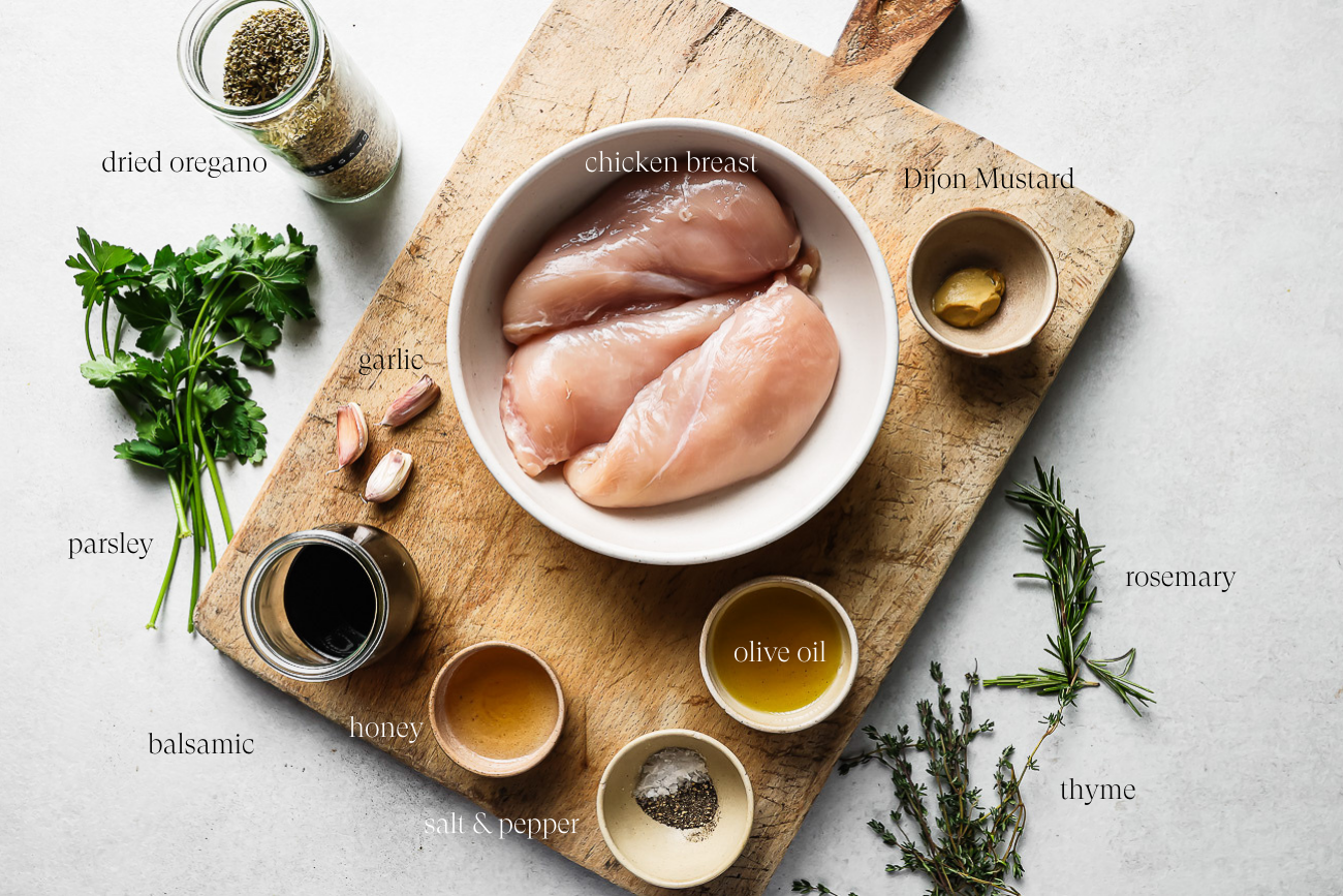 ingredients to make balsamic chicken on a countertop.