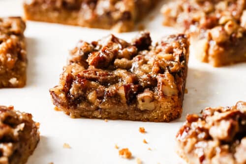 Close up of pecan pie bars on a countertop