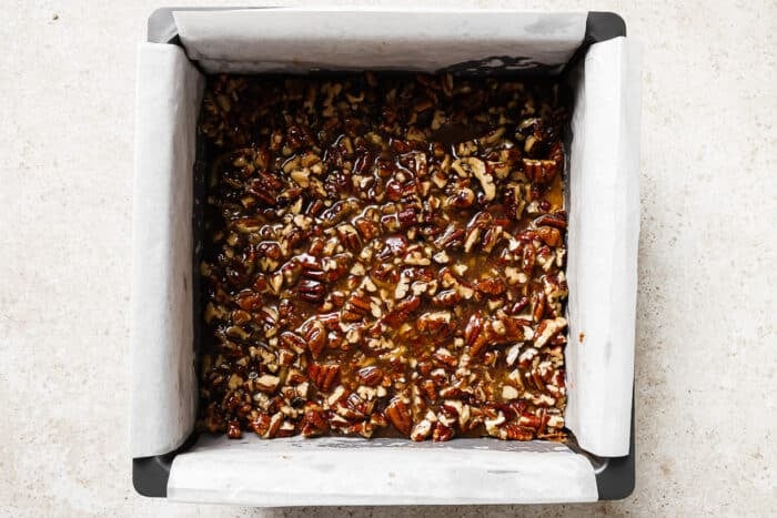 Overhead view of pecan pie bars in a baking pan