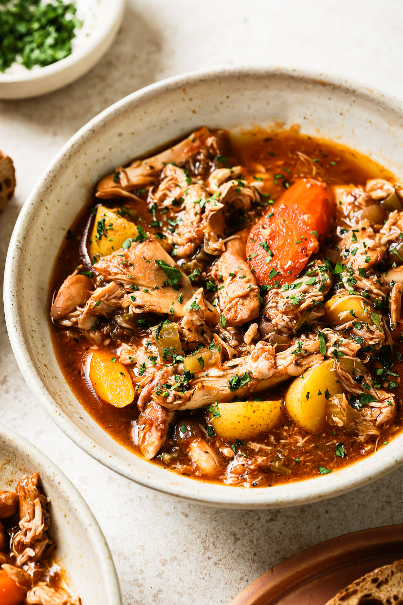 Overhead view of slow cooker chicken stew.