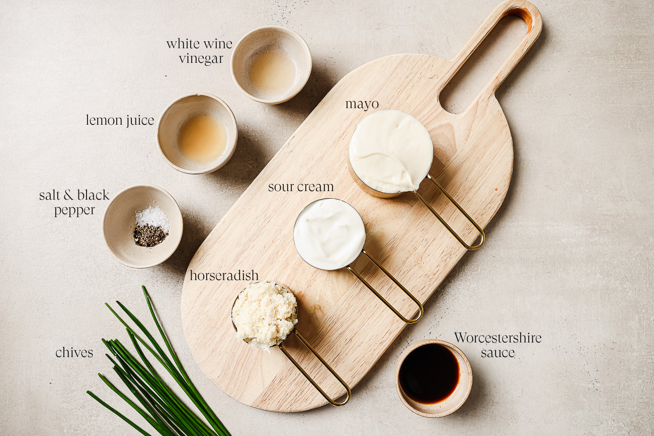 Ingredients to make Horseradish sauce on a countertop.