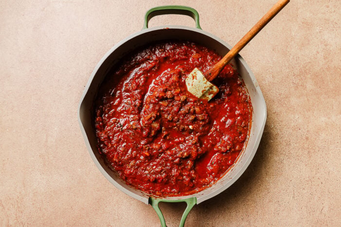 tomato sauce with ground beef in a skillet